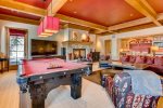 RECREATION ROOM WITH TV, POOL TABLE, FIRE PLACE AND WET BAR